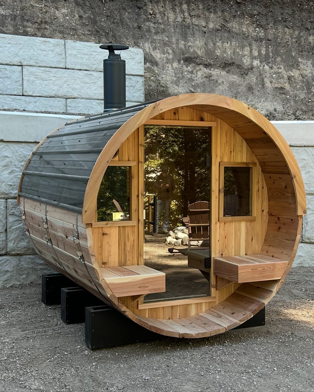XL Barrel sauna with covered porch and chimney at a customer install in Downey, Idaho