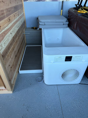 Cold plunge with step platform alongside, viewed from above