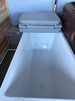 Close view of the cold plunge interior and water jets