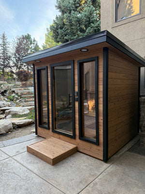 Timberline Lux side and glass front with roof lights, viewed from the patio
