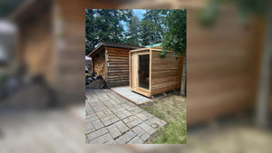 4 Person Blazin Sauna Pod, cedar pod with glass door beside a wood shed on a paver patio
